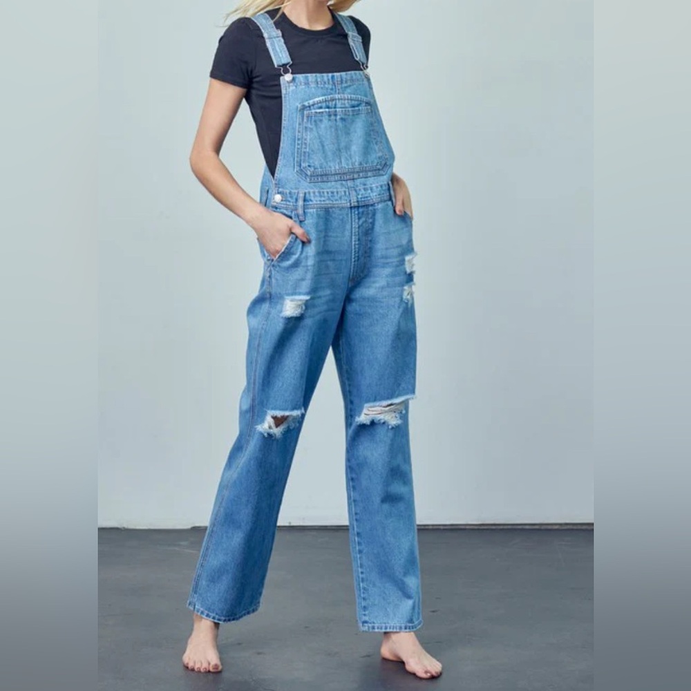 Ripped denim overalls